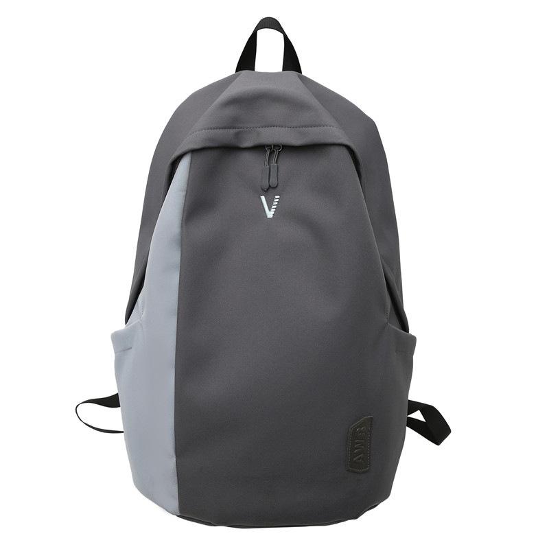 A Male College Student with A Small Simple Large-capacity Computer Backpack
