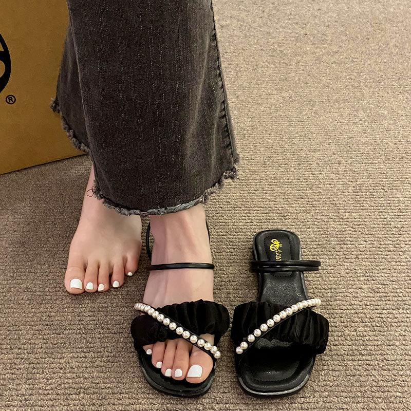 Sommerschönheit mit Rock flacher Sohle coole Hausschuhe Damen Oberbekleidung Sommer 2025 neu Französisches High-End-Feeling Ausgehen Strandschuhe