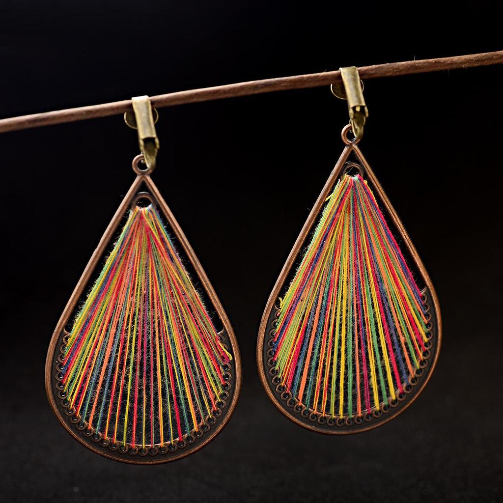 Yunnan Ethnic Bohemian Feather Earrings - Exaggerated No-Pierce Clips for Women