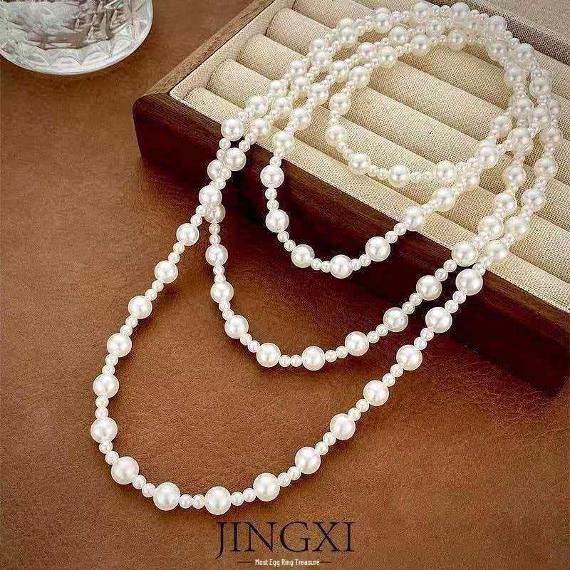 Versatile Multi-Layer Pearl Sweater Chain - Elegant and Fashionable Design
