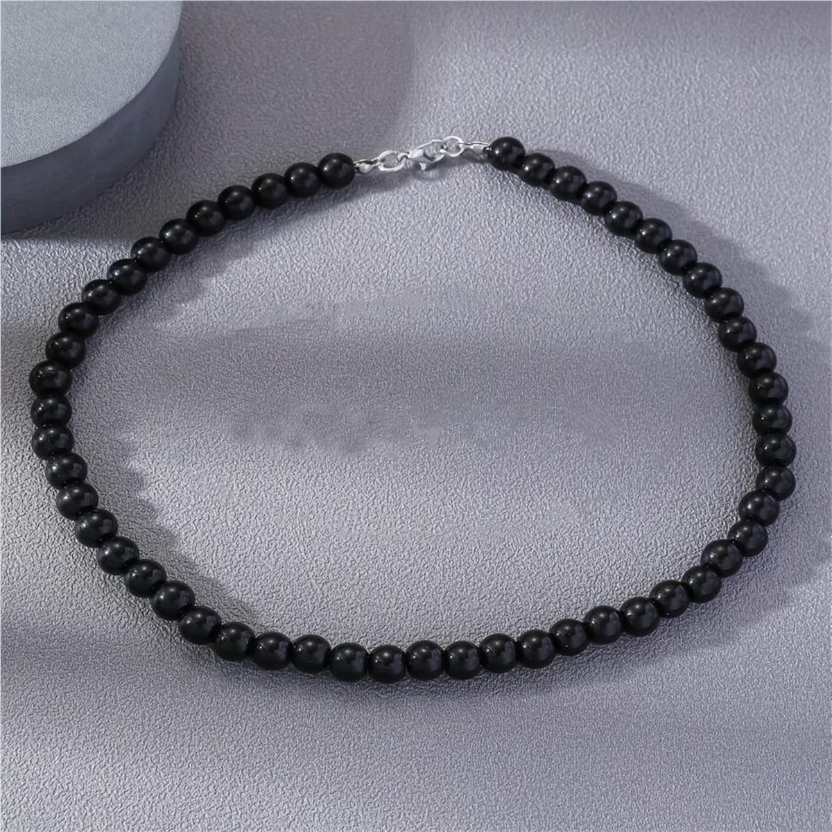 

Мужское ретро минималистичное ожерелье-чокер из бусин под жемчуг чёрный/жемчужный