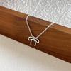 Elegant Bow Necklace: Delicate, Versatile Choker for Women