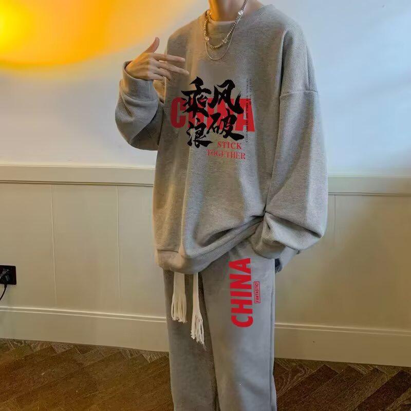Harajuku Trendy Men's Sporty Casual Set: Fashionable Creative Design with Loose Hoodie and Pants.