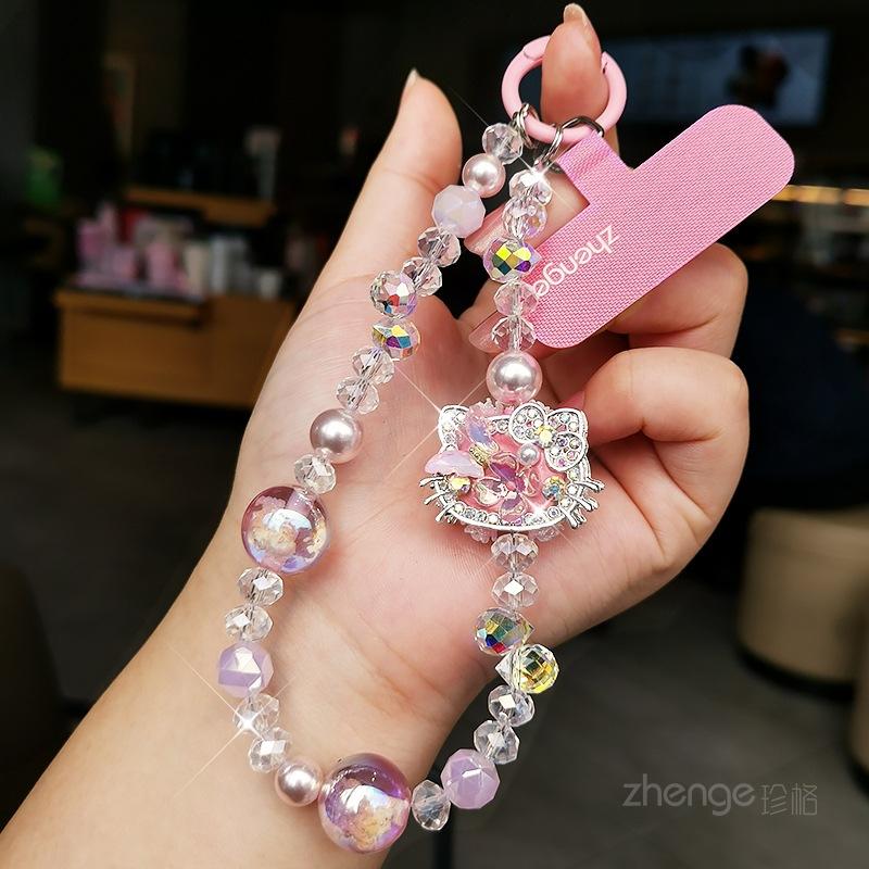 

Cute cat crystal mobile phone chain ins boutique handmade beaded pendant women s niche light luxury wrist pendant short pink long clip