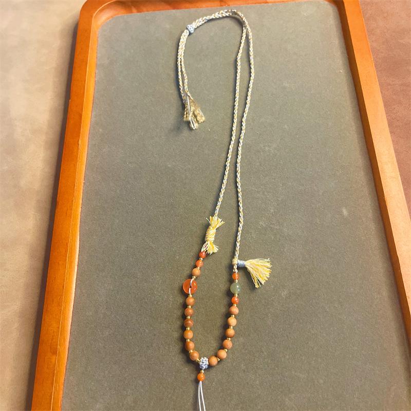 Southern Red Jade and Gold Amber Pendant with Handmade Woven Rope