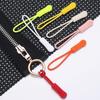 Available: Black Detachable Zipper Pull Lanyard with Silicone Rope.