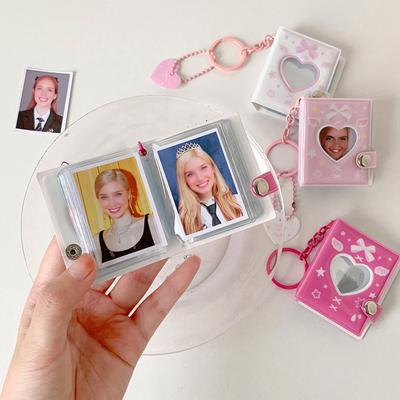 Klíčenka Malý fotoalbum ve tvaru srdce 32 kapes Dutý pořadač na fotokarty pro 2palcové fotografie Mini držák na knihu s fotokartami pro sbírku