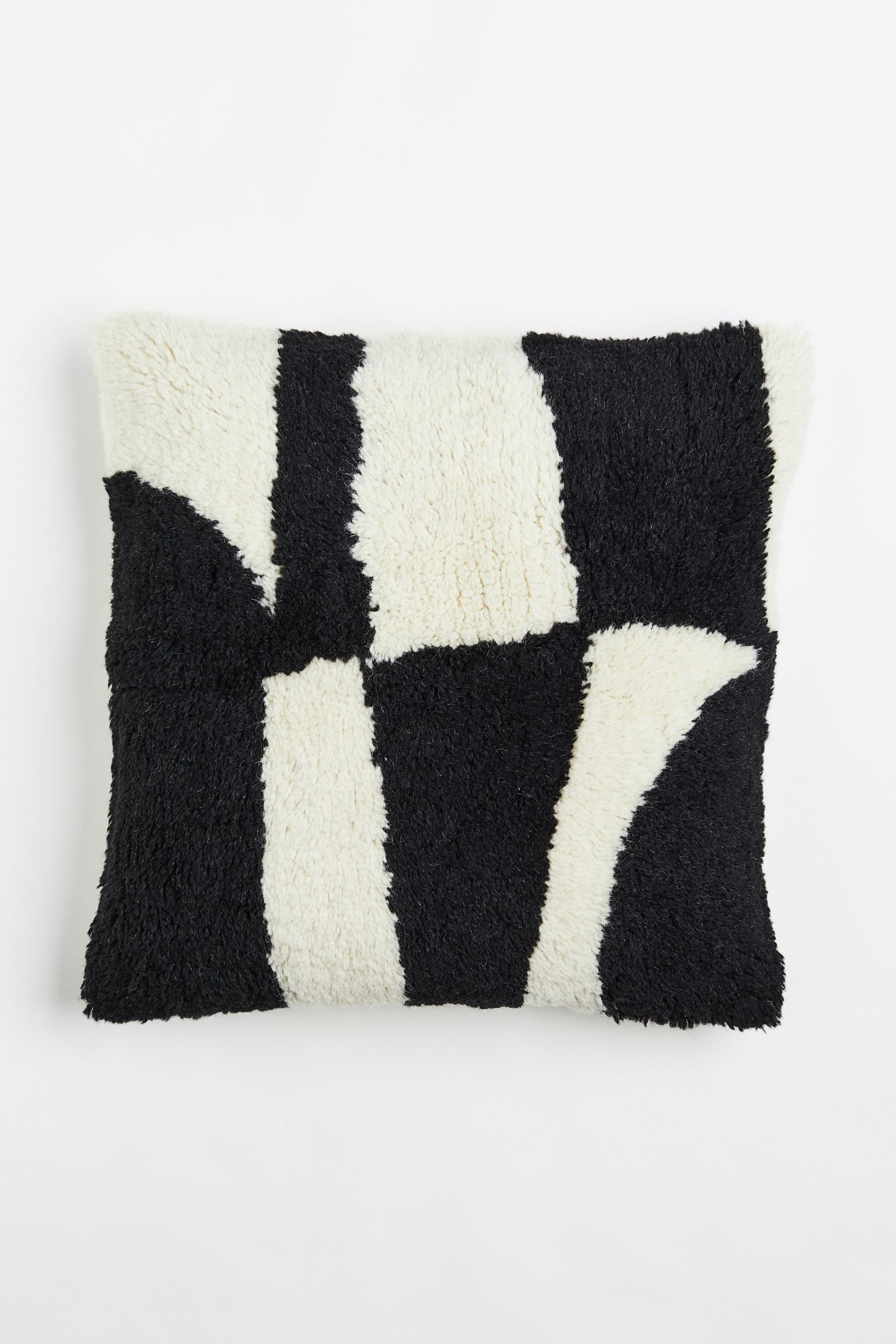 

Tufted wool cushion cover