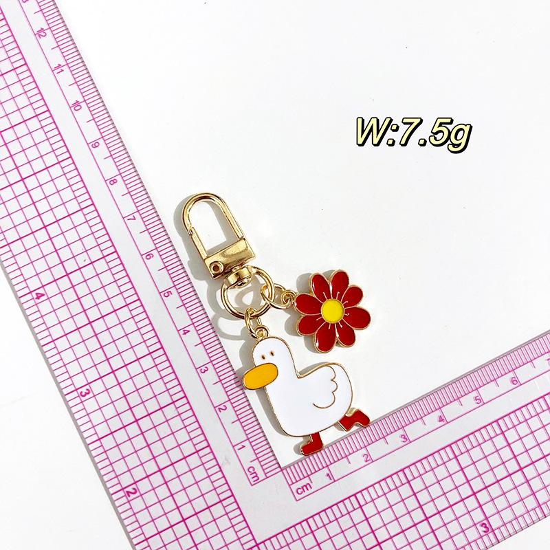Exquisite Metal Flower Duck Keychain Gift: USB Drive, AirPods, Pencil Case, Backpack Pendant Single