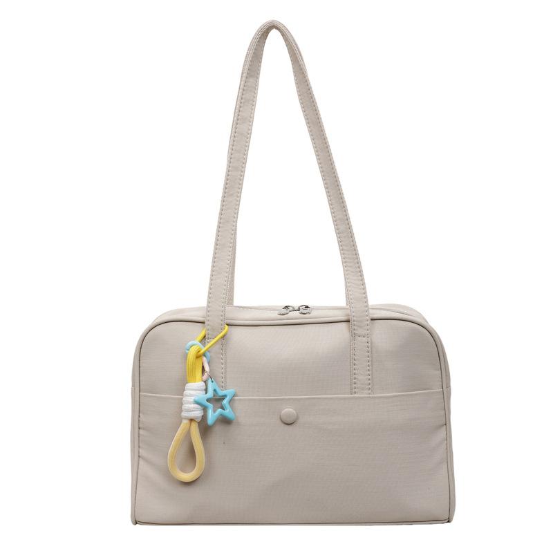 Korean version of simple large-capacity retro portable pillow bag women's 2025 new high-end texture foreign style shoulder armpit bag