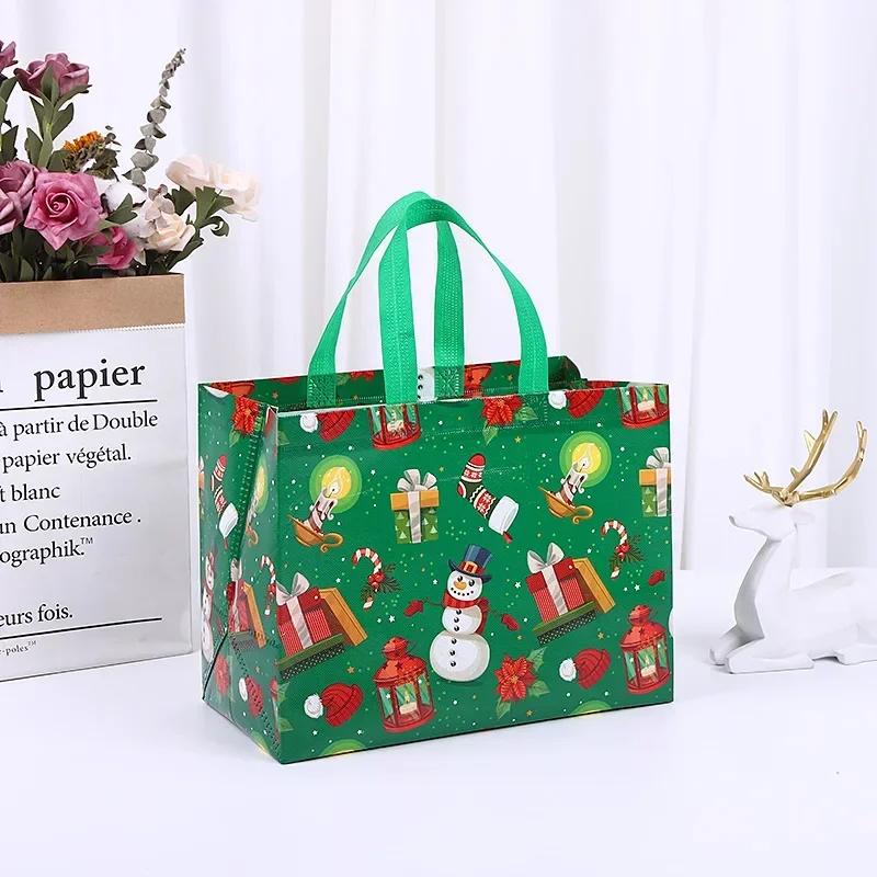 2025 New in Christmas Gift Bags Cartoon Cute Santa Elk Snowman Printing Non Woven Handbag Hot Pressing Wholesale Party Supplies