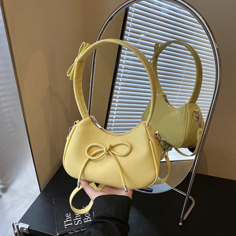 Fashion casual bow shoulder bag new high value sense crossbody armpit dumpling bag