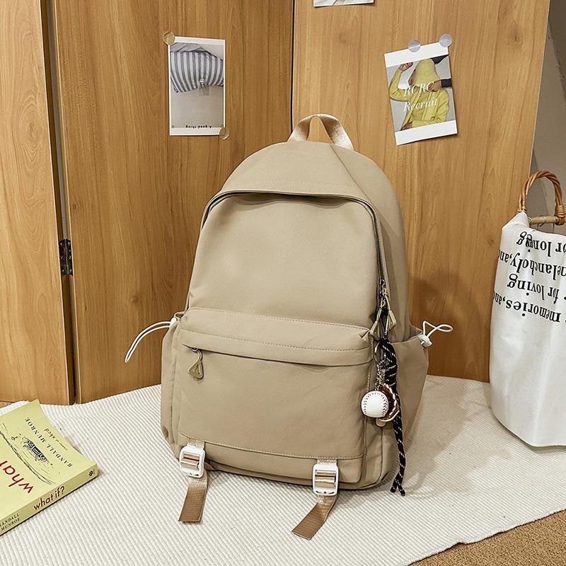 Schoolbag1011 new versatile black schoolbag male college student large capacity backpack female junior high school girl solid color backpack