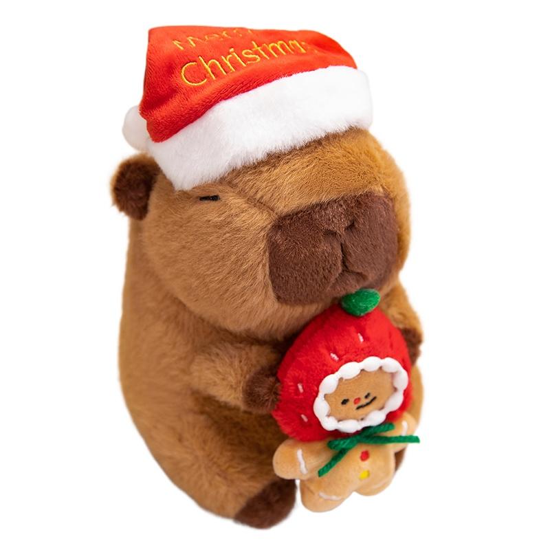 

1Pc 20/25CM Kawaii Christmas Capybara Plush Toys Cartoon Capibara Dolls Wears Xmas Hat Holding Gingerbread Man Nice Christmas Gift 20cm