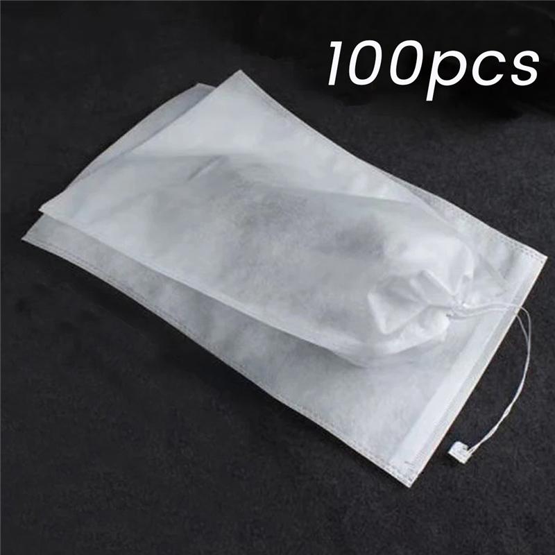 

WON 100Pcs Non-Woven Shoe Dust Covers Dustproof Drawstring Clear Storage Bag Home Organization 24X38cm