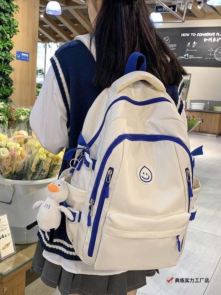 School bag Large capacity computer bag Backpack Boys and girls University campus Simple high junior high school students High value handsome