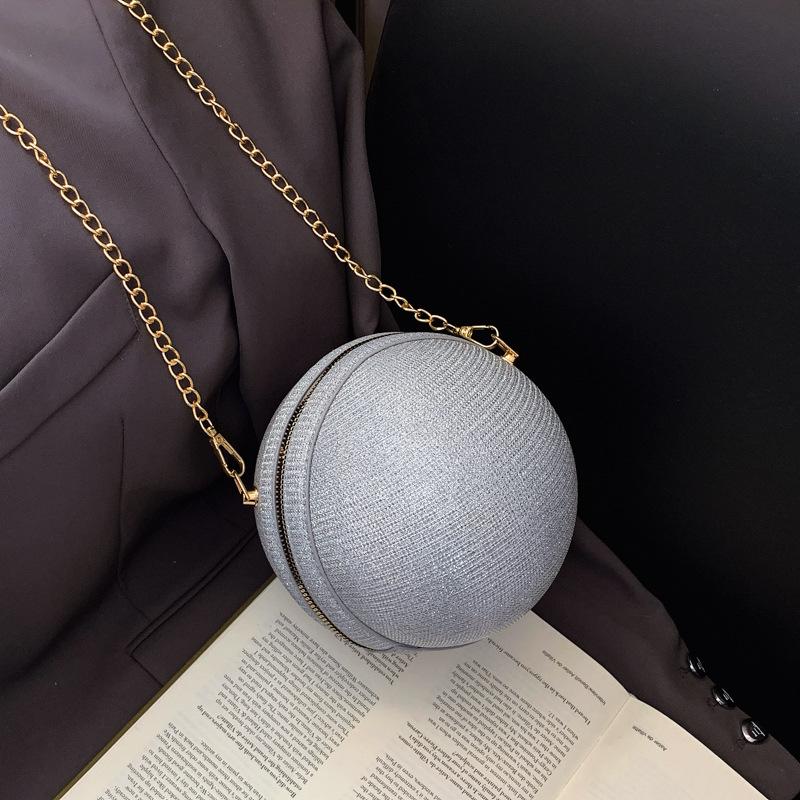 Bag women's bag 2025 new small round bag fashionable metal portable chain trendy shoulder crossbody personalized design bag