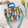 Bolsa de lona de desenho animado 2025 nova menina suave boneca fofa engraçada grande capacidade ombro plissada bolsa de mão
