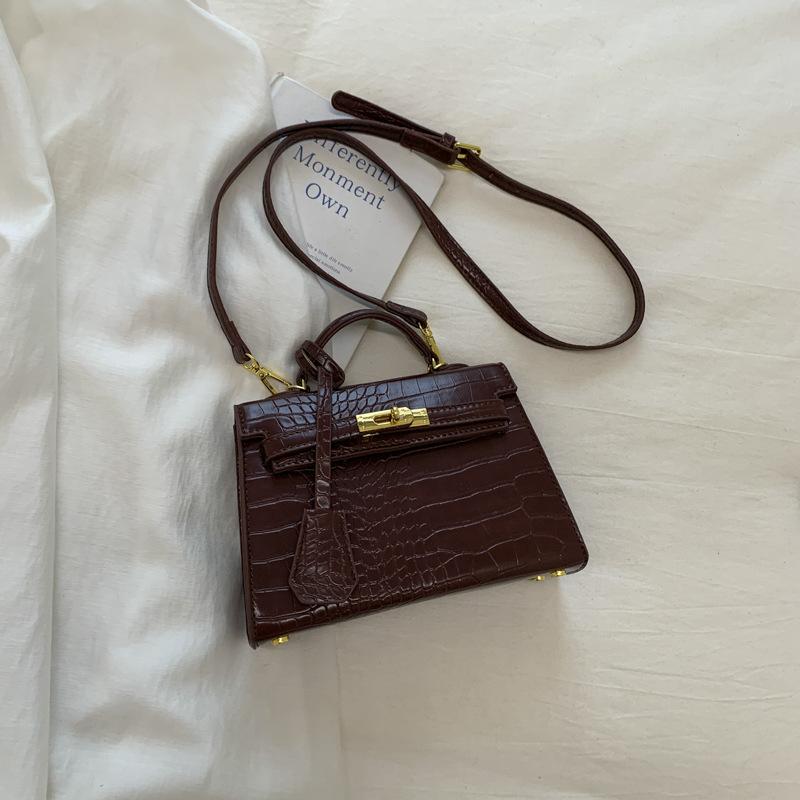 Korean version of fashionable niche stone pattern bag 2025 autumn new texture handbag retro fashion messenger bag bag