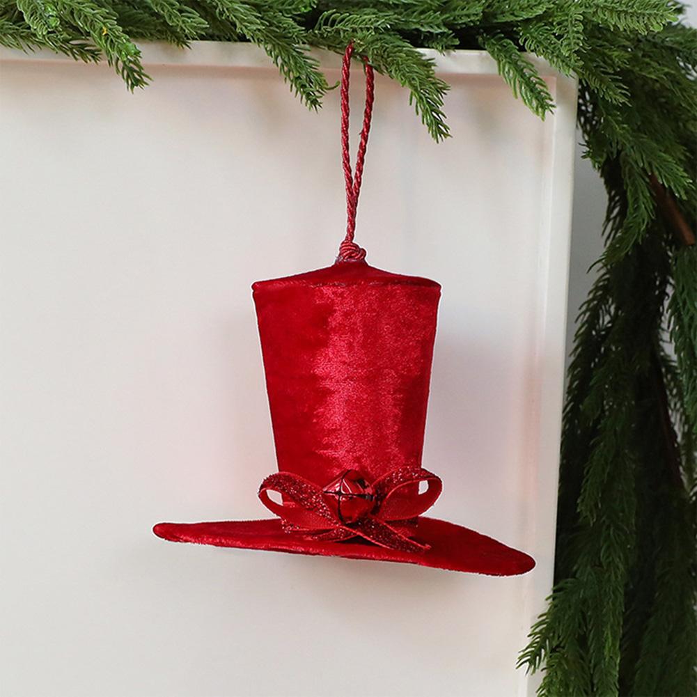 Set of 4 holiday fabric top hat ornaments featuring ribbon and bell accents for a cozy and elegant Christmas tree decoration