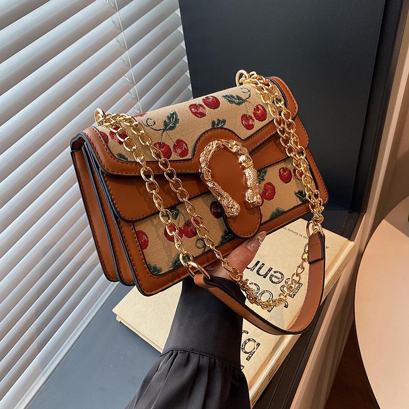New fashion high-end cherry contrasting color Bacchus bag single shoulder crossbody trendy women's bag