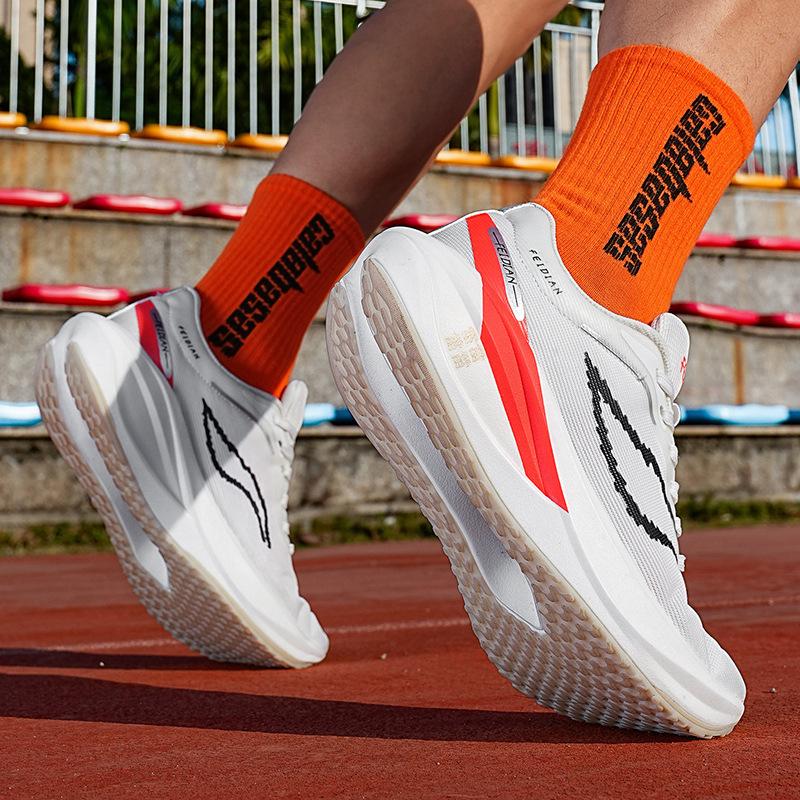 Running shoes Junior high school male breathable lightweight sports and leisure trendy shoes popcorn carbon board cushioning middle age and older ch