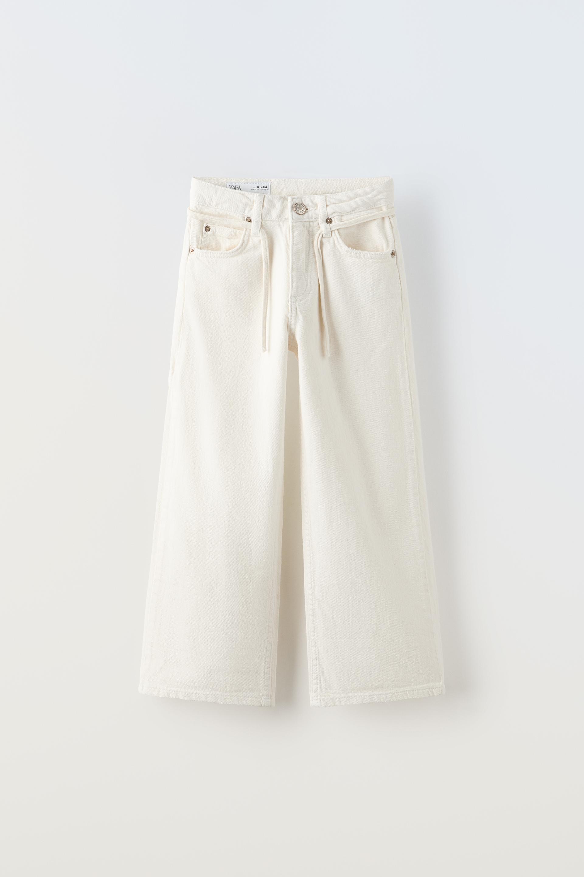 

ШИРОКИЕ ДЖИНСЫ НА ПУГОВИЦАХ