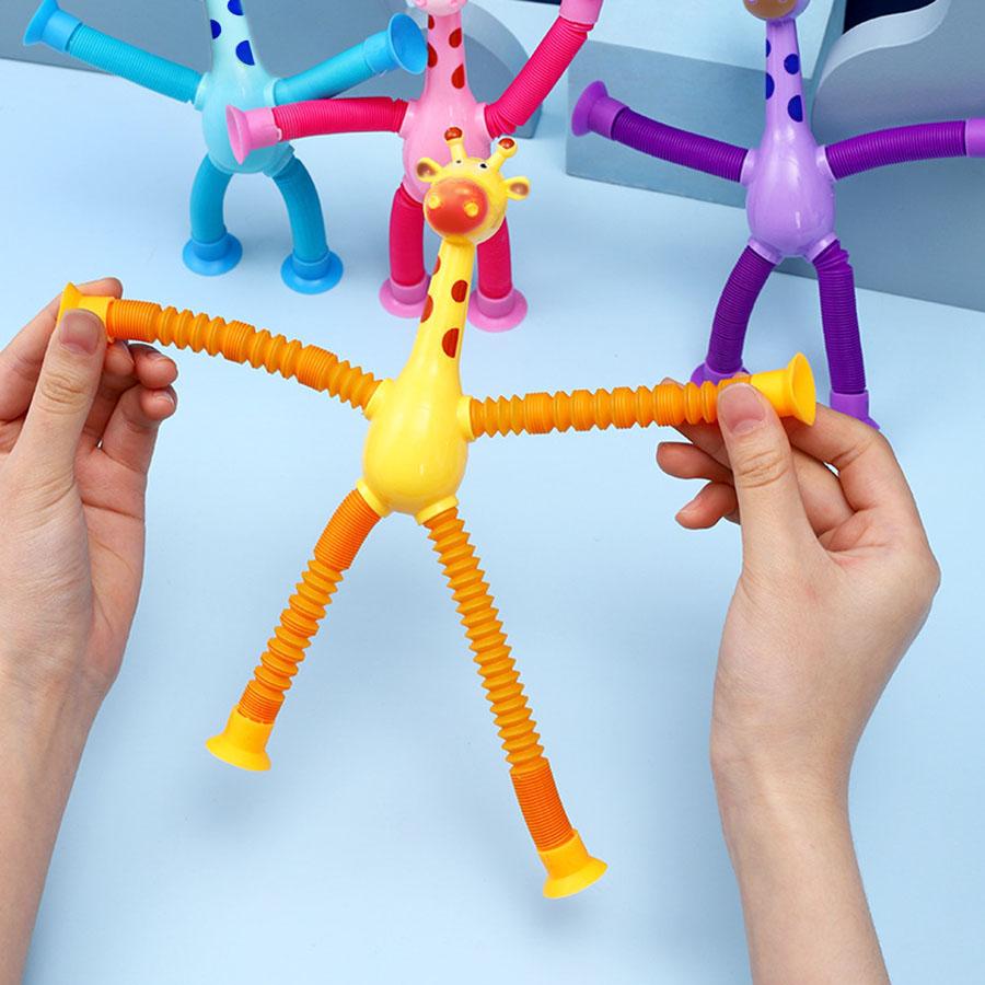 Suction cup giraffe robot telescopic toy with versatile light, elongated tube, children's cartoon creative puzzle toy