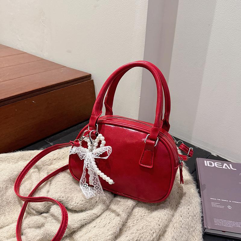 Neue Nischendesign modische Textur Handtasche Bowlingtasche Damen vielseitige Schulter Umhängetasche