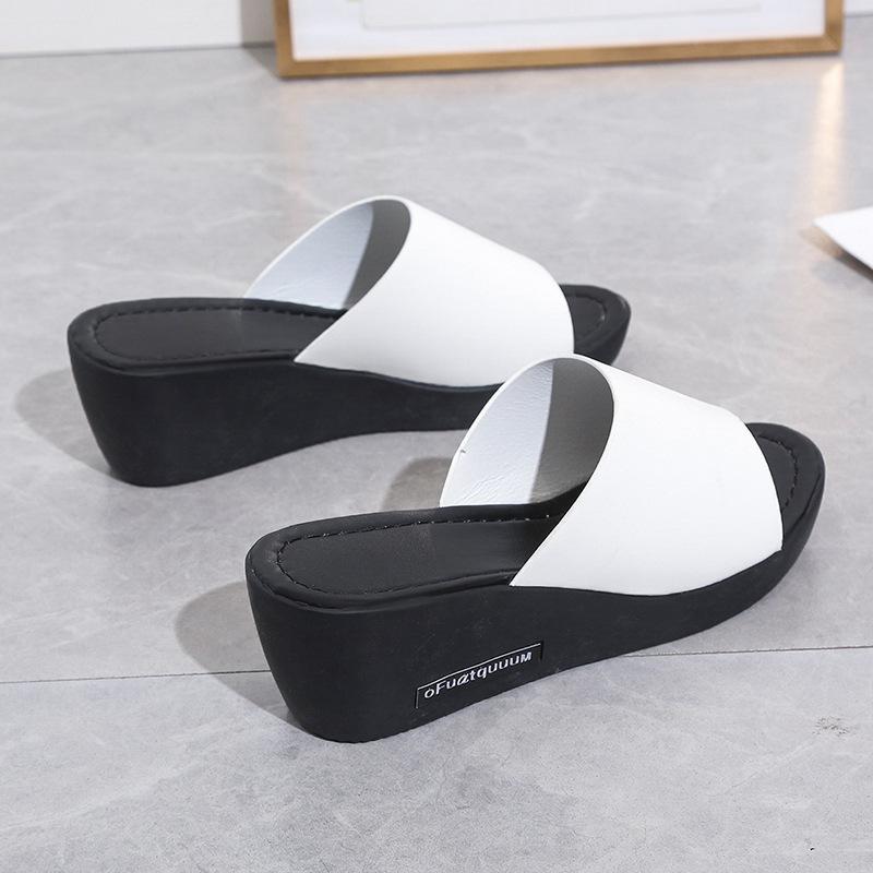 2025 summer Korean version of the new European and American slope heel fish mouth thick bottom muffin one word PU leather cool slippers high heel slip