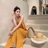 Seaside vacation style summer new dress women's clothing design sense loose yellow fringed suspender medium and long dress
