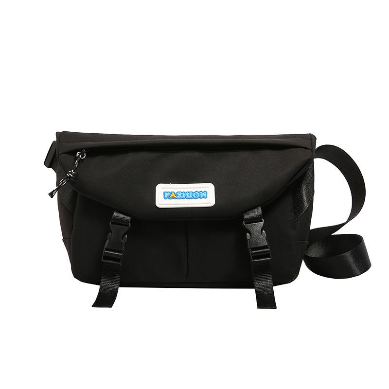 

Japanese Harajuku large-capacity messenger bag female ins versatile student class mailman bag large-capacity couple shoulder bag чорний