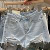 Pantaloncini di jeans strappati da donna taglie forti - Stile a trapezio ampio e sfilacciato