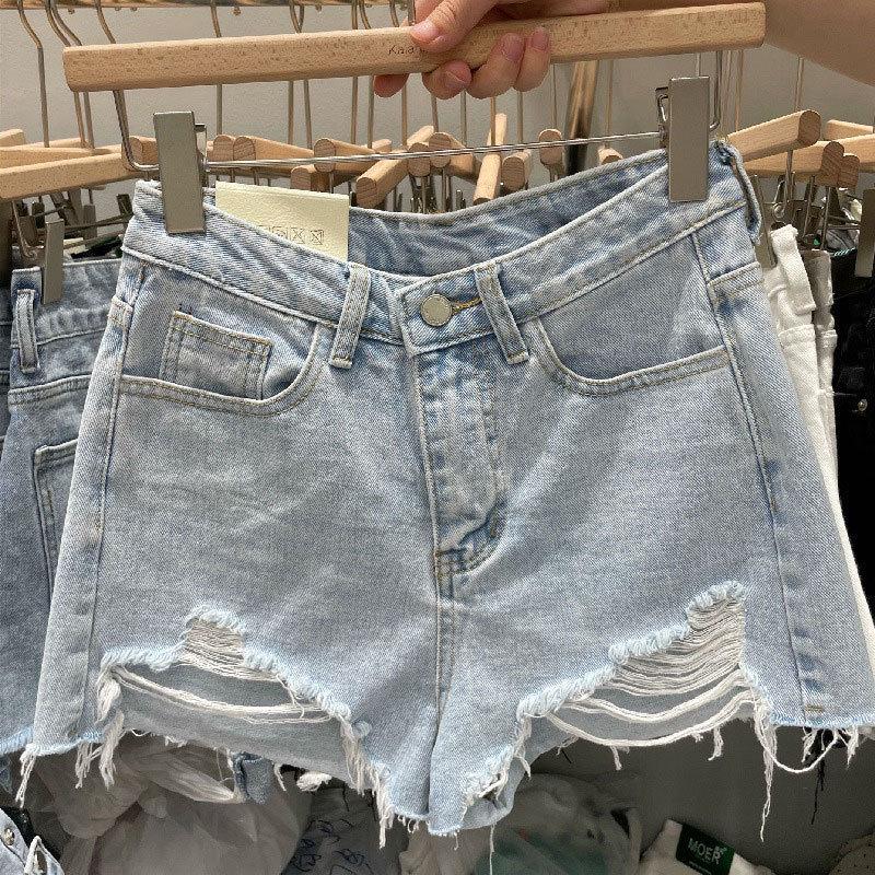 Pantaloncini di jeans strappati da donna taglie forti - Stile a trapezio ampio e sfilacciato