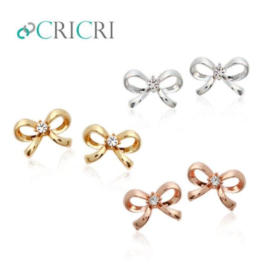 

Silver pin earrings ribbon made with Cricri crystals Rose gold