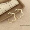Retro Leopard Print Hoop Earrings: Exaggerated Hong Kong Style with Silver Needle Flocking for Women