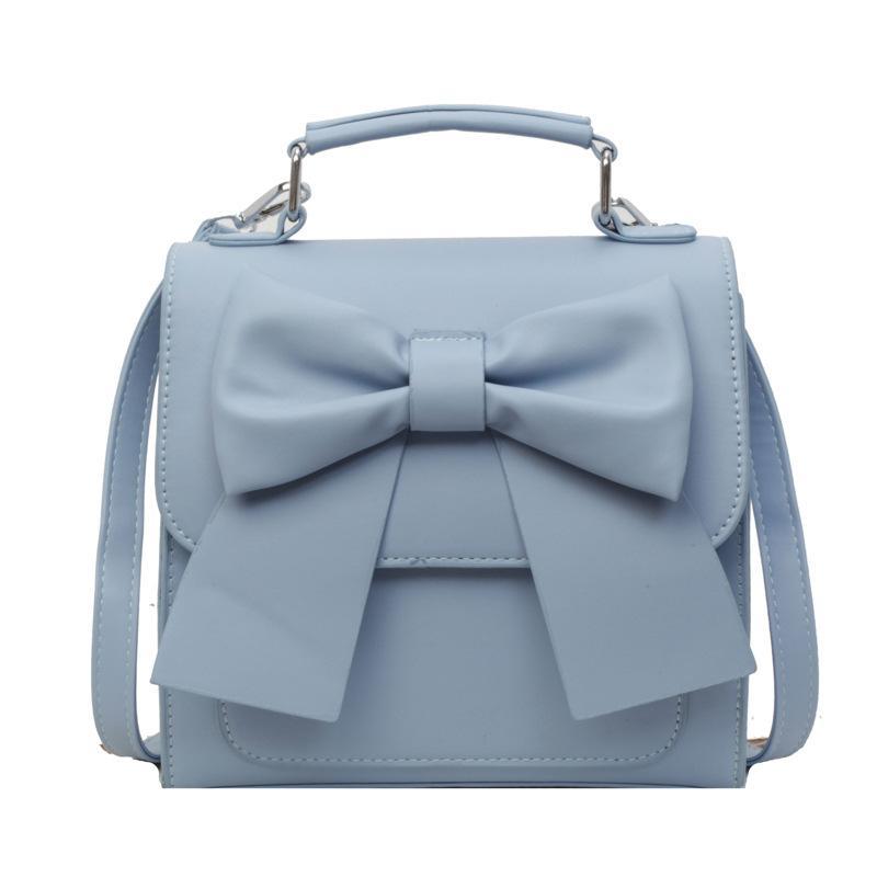 Backpack women's new texture niche design portable bow schoolbag lightweight travel backpack