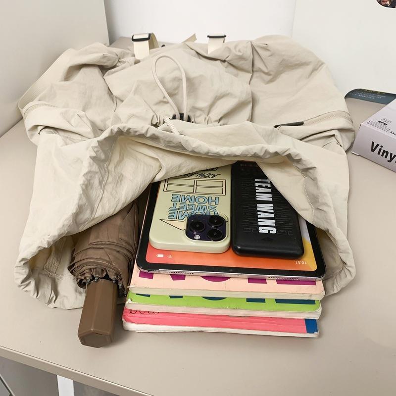 Schoolbag Korean version lazy wind drawstring backpack women's bag 1011 summer new high-value large-capacity lightweight breathable backpack