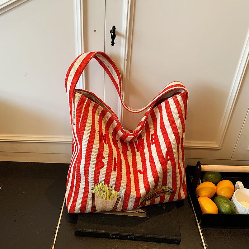 Korean casual lazy style canvas bag women's 2025 new large-capacity striped bucket bag fashionable shoulder bag