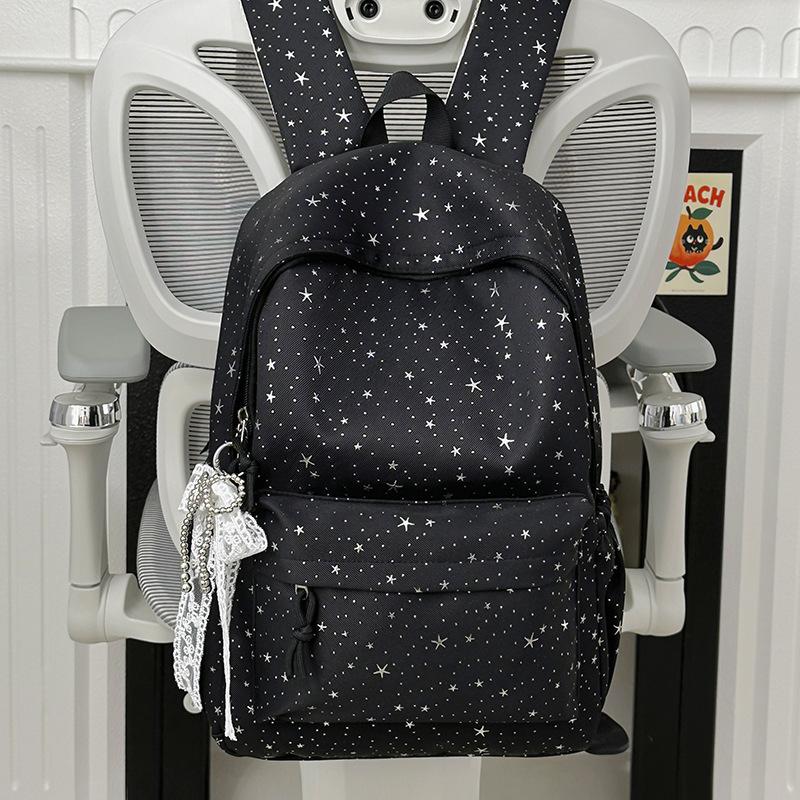 Schoolbag schoolbag new 1011 hot stamping three-dimensional star printing high school students large capacity fresh and sweet casual backpack