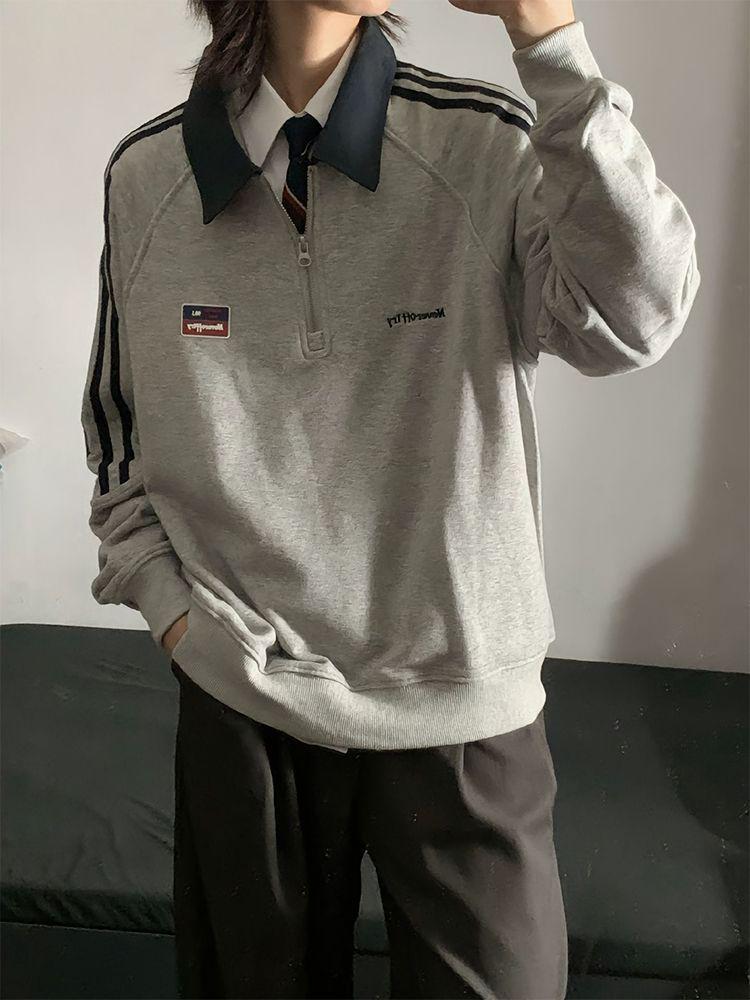 Damska bluza retro z półzapięciem na zamek i kołnierzykiem polo - styl college'owy, luźny krój na jesień/zimę 2025