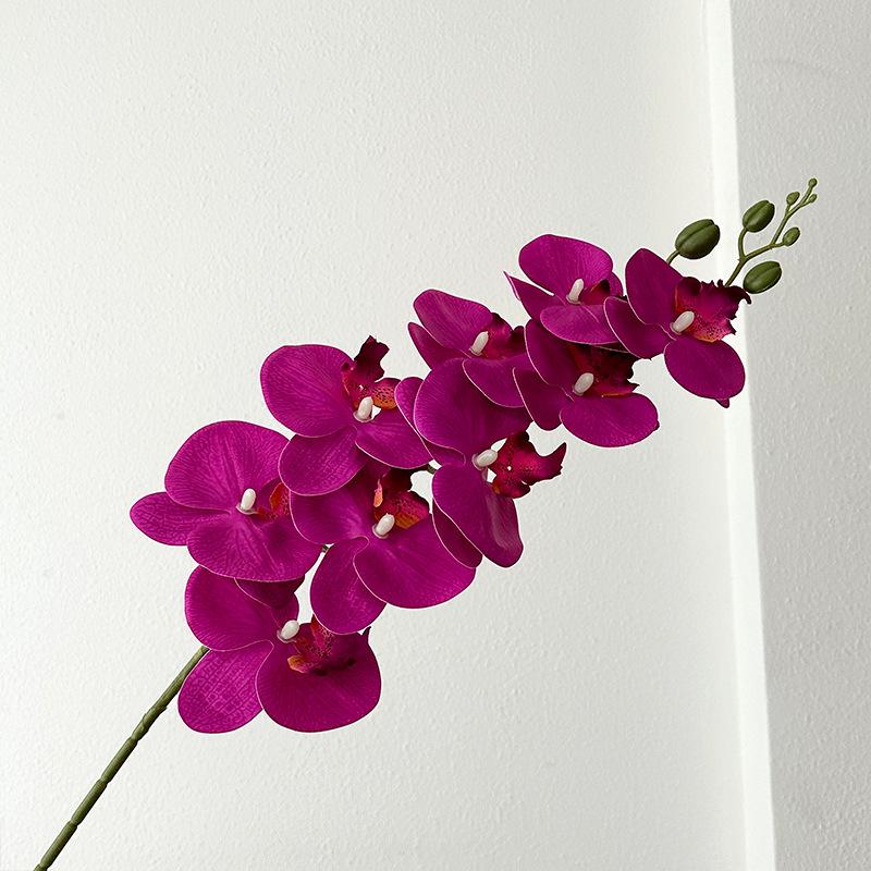 Bionic Phalaenopsis Floral Arrangement: Realistic Fake Flower Decor for Living Room or Dining Table.