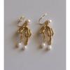 Sweet and cool personality natural freshwater pearl bow mosquito coil disc earclip temperament cold wind earrings women's stud earrings