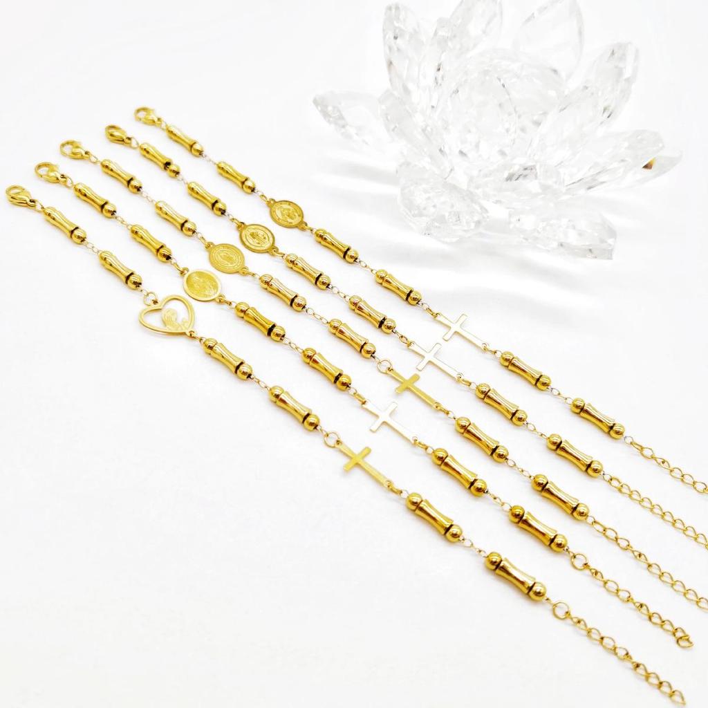 Bracelet de protection pour femme en perles de bambou dorées et croix