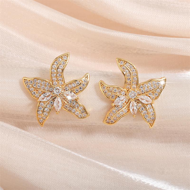 ZAKOL Sliver Color Shiny Tiny Zircon Starfish Lily Flower Shape Stud Earrings Luxury Bridal Wedding Zircon for Women