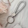 Gevlochten Lederen Touw Sleutelhanger met Poppenhanger - Modieus en Creatief Accessoire
