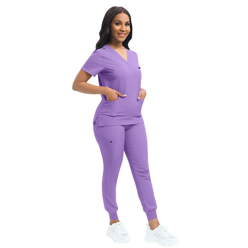 Ensemble Scrubs Stretch Femme Uniformes d'Infirmière Ensemble Scrubs Cliniques Infirmière Médecin Vêtements de Travail Anti-Poussière Haut Scrubs Médicaux + Pantalon Jogger