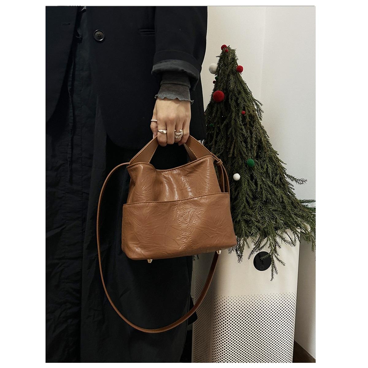 

Женские сумки большой вместимости, Высококлассная нишевая сумка-ведро кроссбоди с узором для ручной переноски кофейный