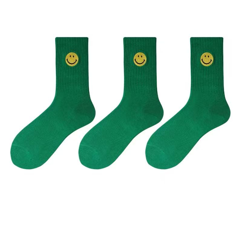 Einfarbige, mittellange Socken mit frischem, lächelndem Gesichtsmuster, schlichtem Design, bequem und atmungsaktiv.