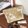 "Compact Fresh Cosmetic & Skincare Travel Bag - Portable Handheld Storage for Toiletries & Underwear"